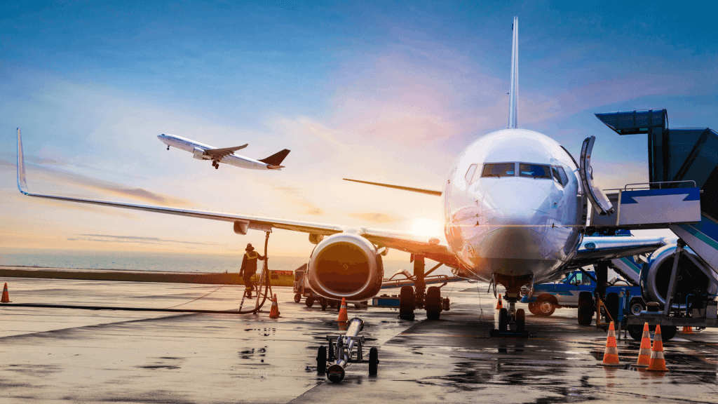 An airplane sitting on the tarmac at an airport