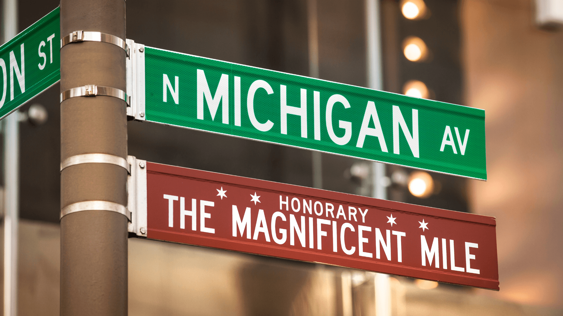 a street sign for Michigan Ave and The Magnificent Mile.