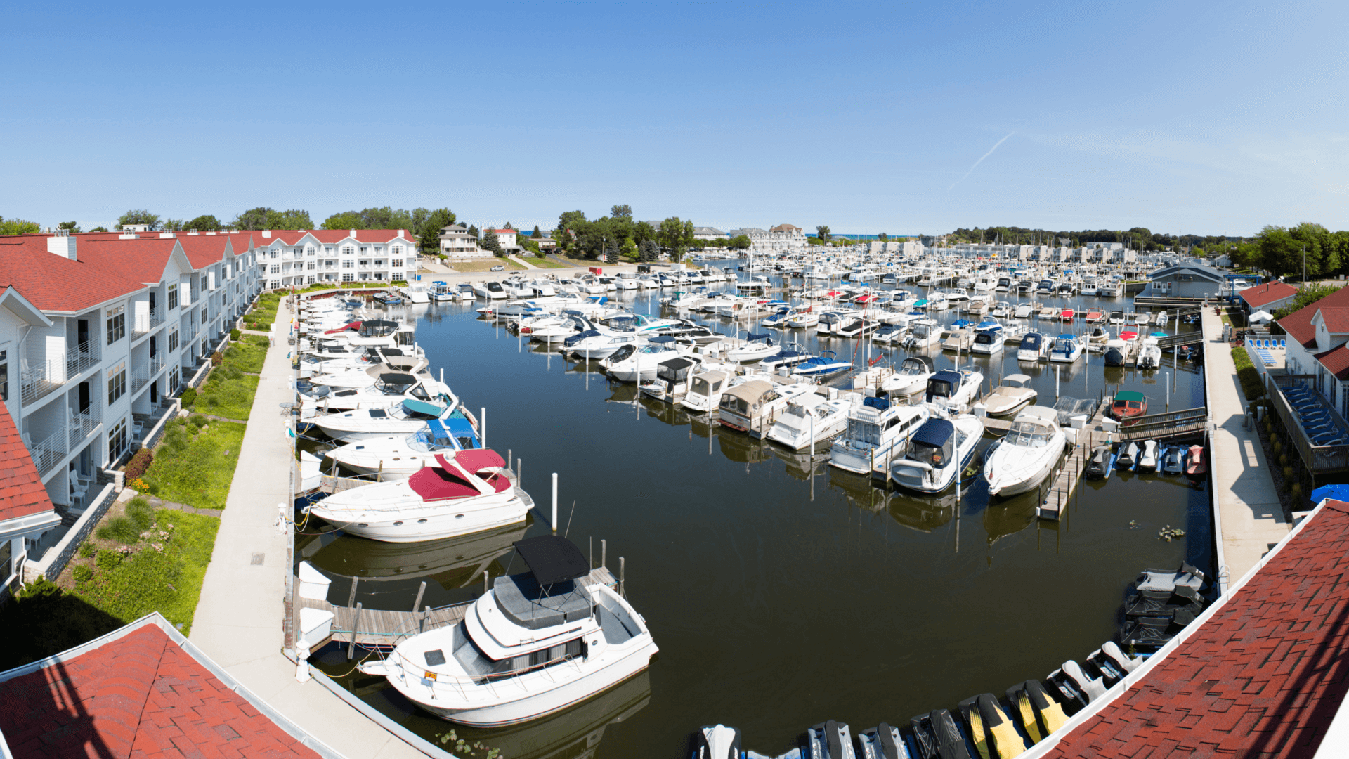 a view of a marina with many boats docked in it