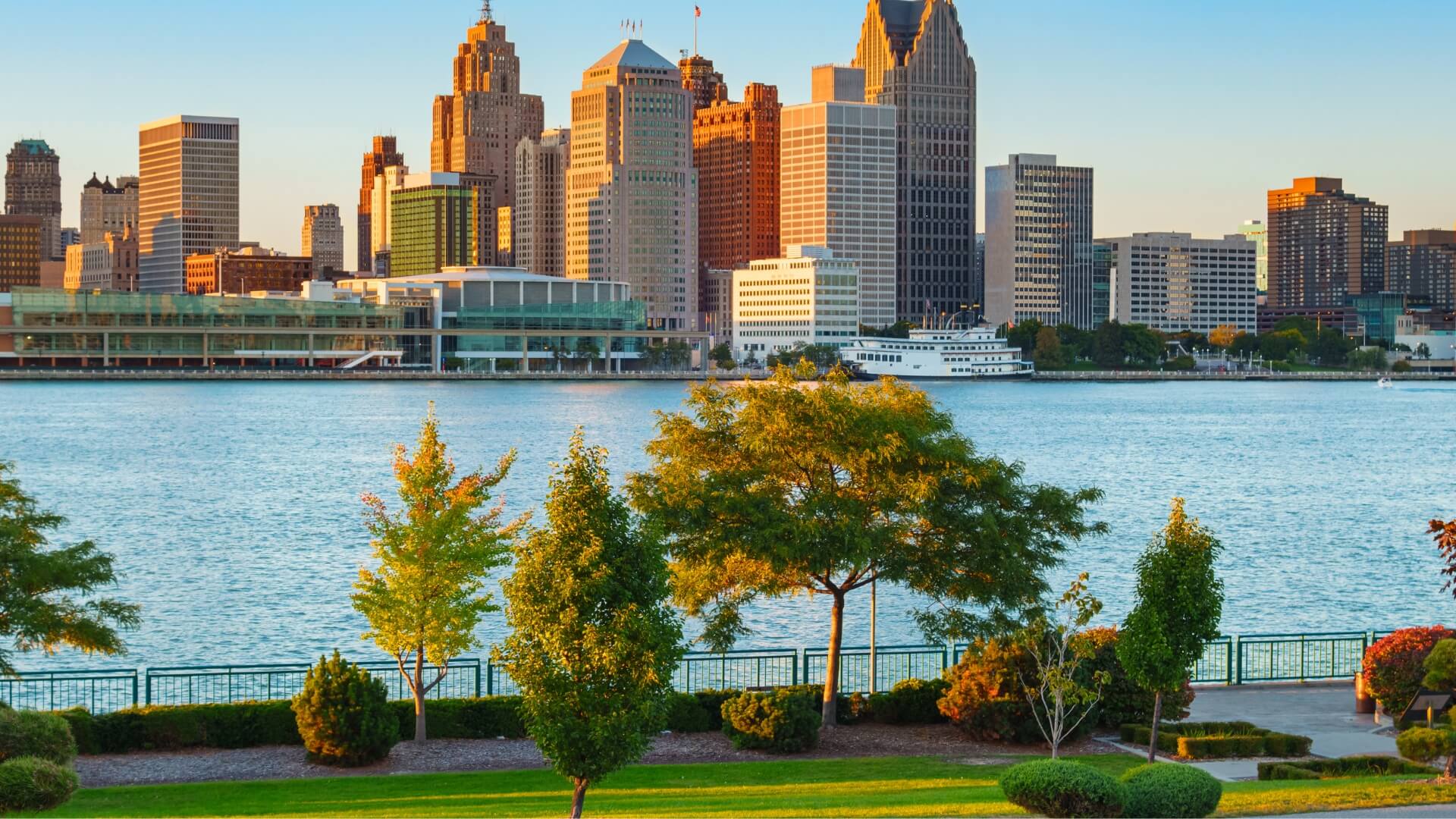 a view of the detroit skyline from across the water